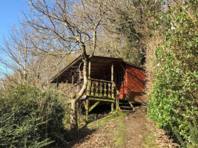Surfers and walkers cosy camping cabin